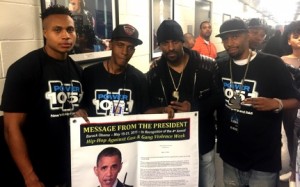 Sharieff "The Fitness Sheriff," C. Fisher, DJ Clue? and R. Fisher holding Presidential Message from Obama.​