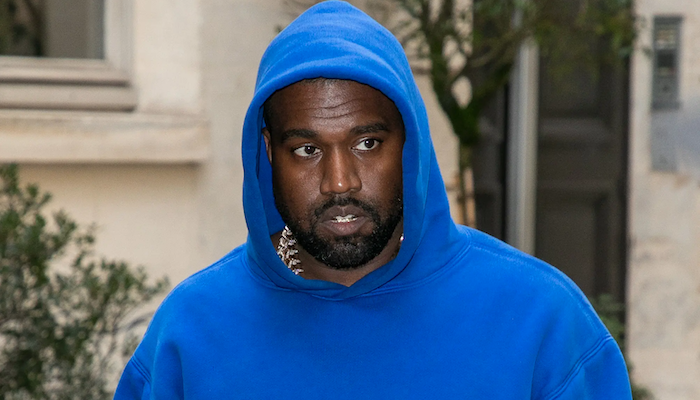 EXCLUSIVE: Kanye West Stalked By Former Trainer While On Family Vacation