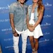 Jermaine Jones L and Sarah Gerth at Carmelo Anthony Kehinde Wiley Dinner Hosted by GREY GOOSE