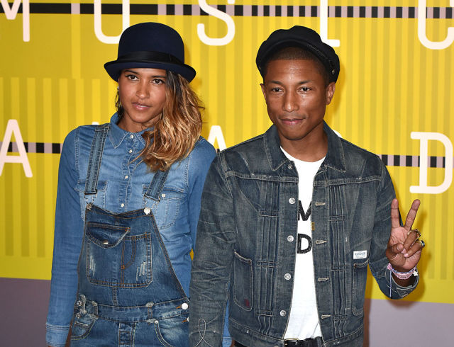 Musician Pharrell Williams and his wife Helen Lasichanh are seen