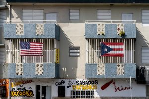 px US and Puerto Rico flags on a building in Puerto Rico e