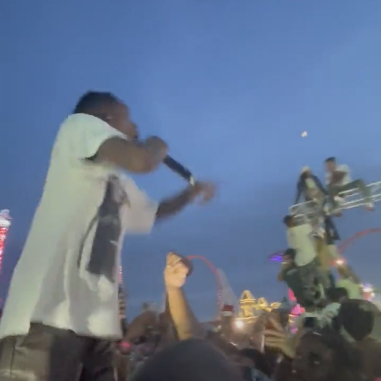 Travis Scott Stops Coney Island Performance as Fans Climb Lighting Structures #TravisScott