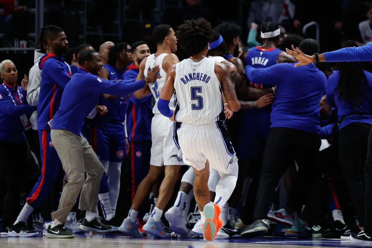 SOURCE SPORTS 11 Players Suspended After PistonsMagic Scuffle in Detroit The Source
