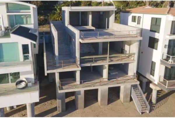 An old pencil drawing of Don Quixote and Sancho Panza sitting on their horses, by Wilhelm Marstrand.