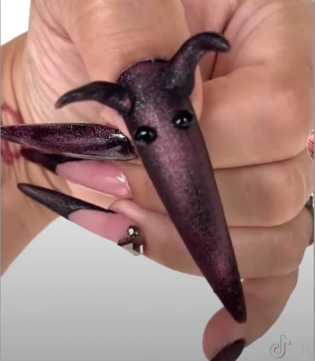 Doja Cat’s “Paint the Town Red” is one of the hottest singles of the holiday season and nail artist @n4list on TikTok gives a whole tutorial on her “Paint the Town Red”-inspired set