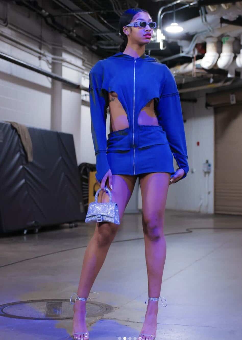 Chicago Sky star Angel Reese rocked a sky blue fit with strategic cutouts ahead of the highly-anticipated (and ultimately controversial) game against the Indianapolis Fever. 